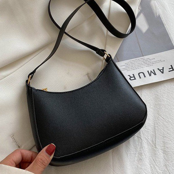 Echoarchiv | Luxuriöse Retro-Tasche Exklusive Lederhandtasche mit Zeitlosem Charme