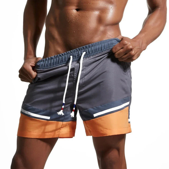 Echoarchiv | Schnell Trocknende Badeshorts für Männer mit Farbblock-Patchwork