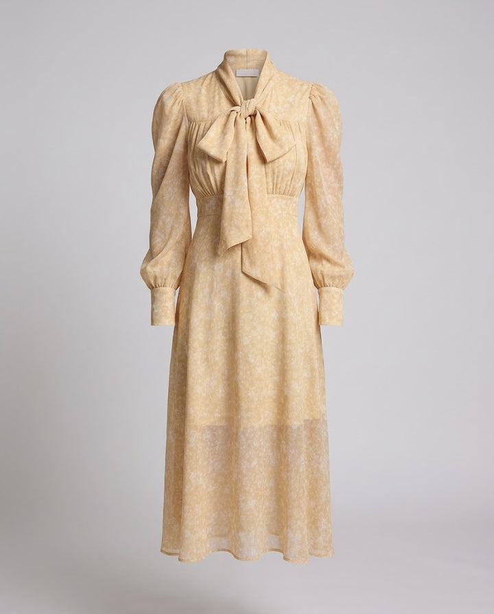 Damen Geblümtes Maxikleid mit Schleifenkragen und Puffärmeln Echo Archiv