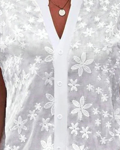 Echoarchiv | Kurzärmlige Blumenbluse mit V-Ausschnitt