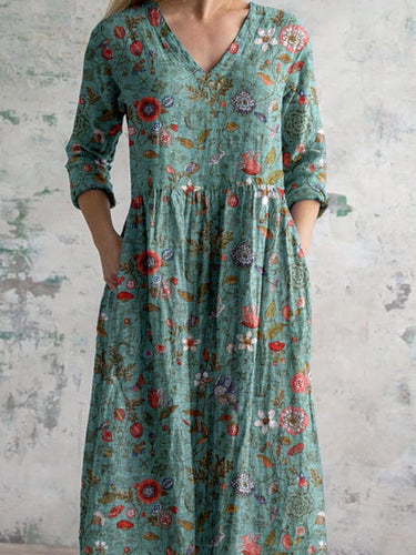 Echoarchiv | Bauchbedeckendes Blumenkleid
