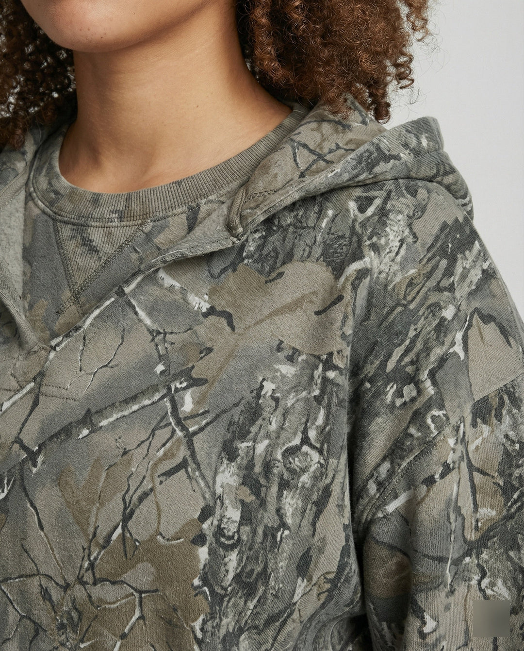 Echoarchiv | Retro Unisex Hoodie mit Camouflage-Muster