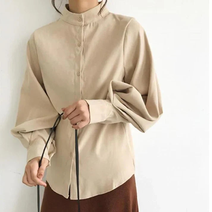 Echoarchiv | Klassische Rollkragenbluse mit Ballonärmeln
