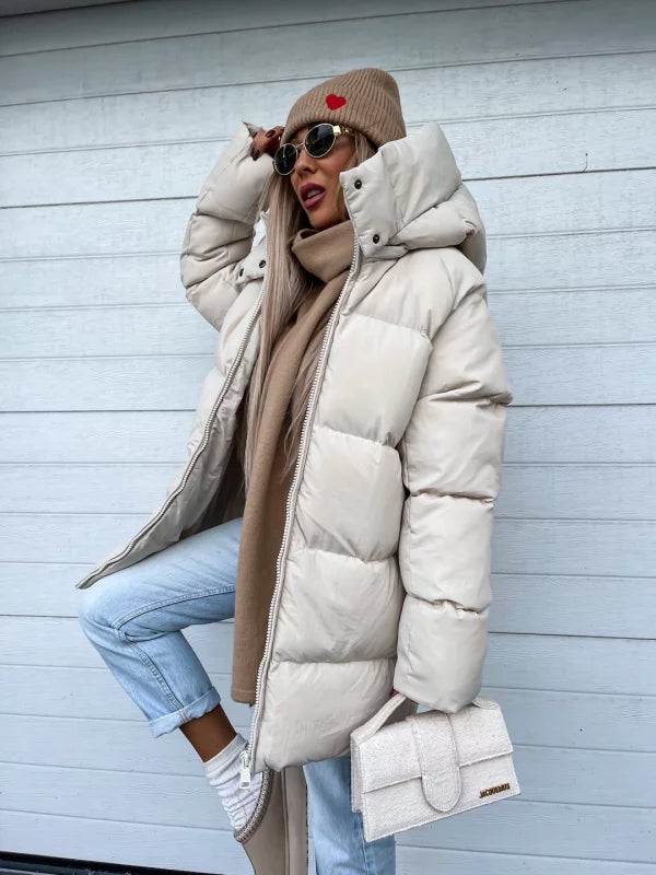 Echoarchiv | Elegante und leichte Daunenjacke für Damen