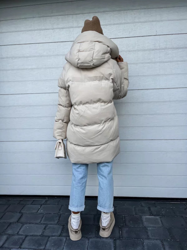 Echoarchiv | Elegante und leichte Daunenjacke für Damen
