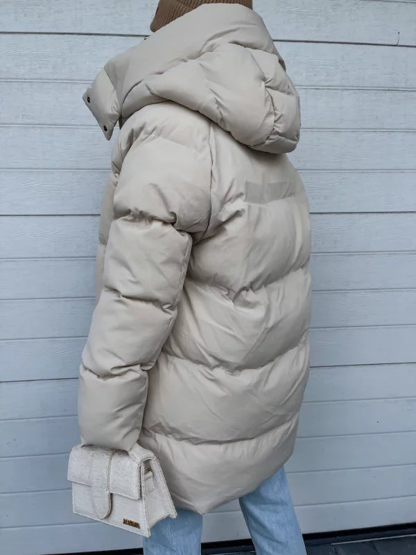 Echoarchiv | Elegante und leichte Daunenjacke für Damen