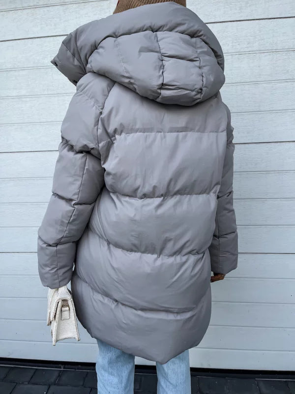 Echoarchiv | Elegante und leichte Daunenjacke für Damen