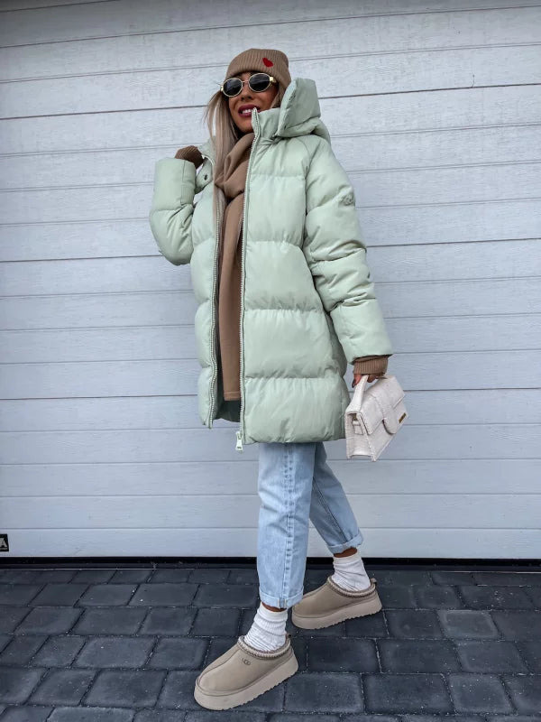 Echoarchiv | Elegante und leichte Daunenjacke für Damen