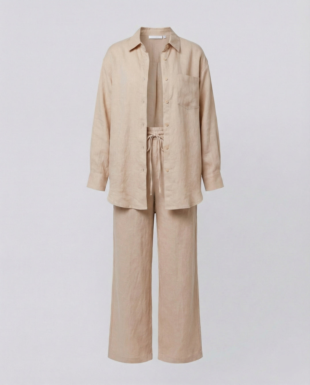 Damen Lässiges Leinen-Outfit mit weit geschnittenem Hemd und lockeren Hosen Echoarchiv