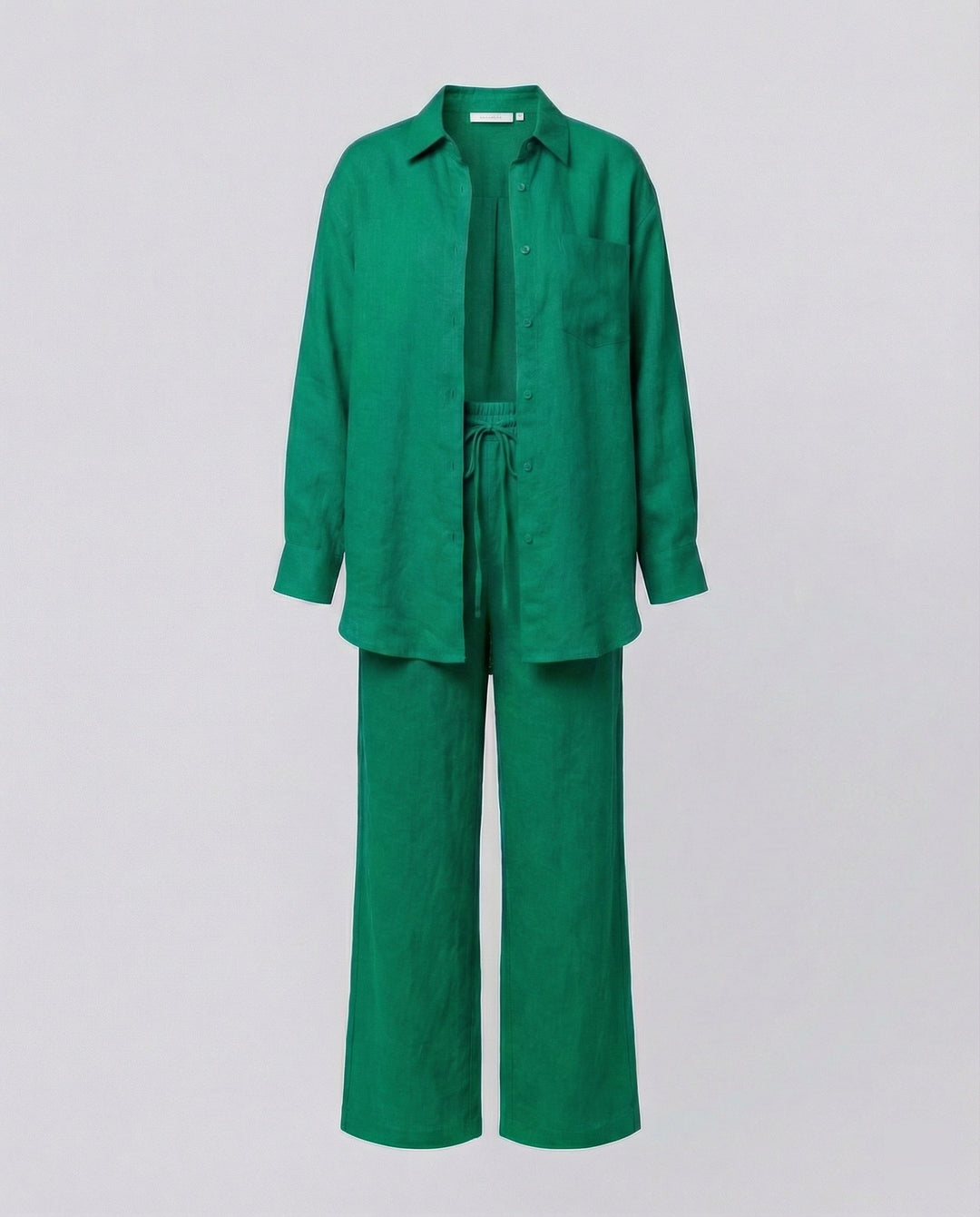 Damen Lässiges Leinen-Outfit mit weit geschnittenem Hemd und lockeren Hosen Echoarchiv