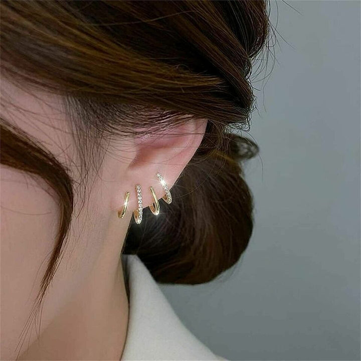 Echoarchiv Umwerfende hypoallergene Ohrwickel-Ohrringe