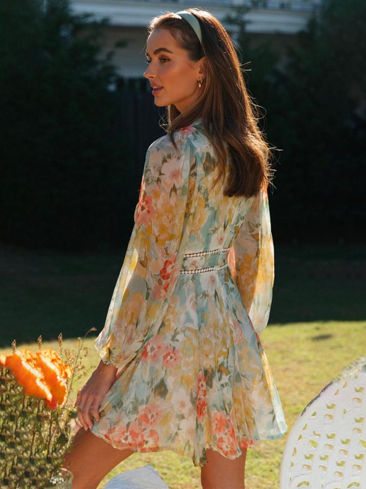 Echoarchiv | Bedrucktes Minikleid mit V-Ausschnitt und Spitze