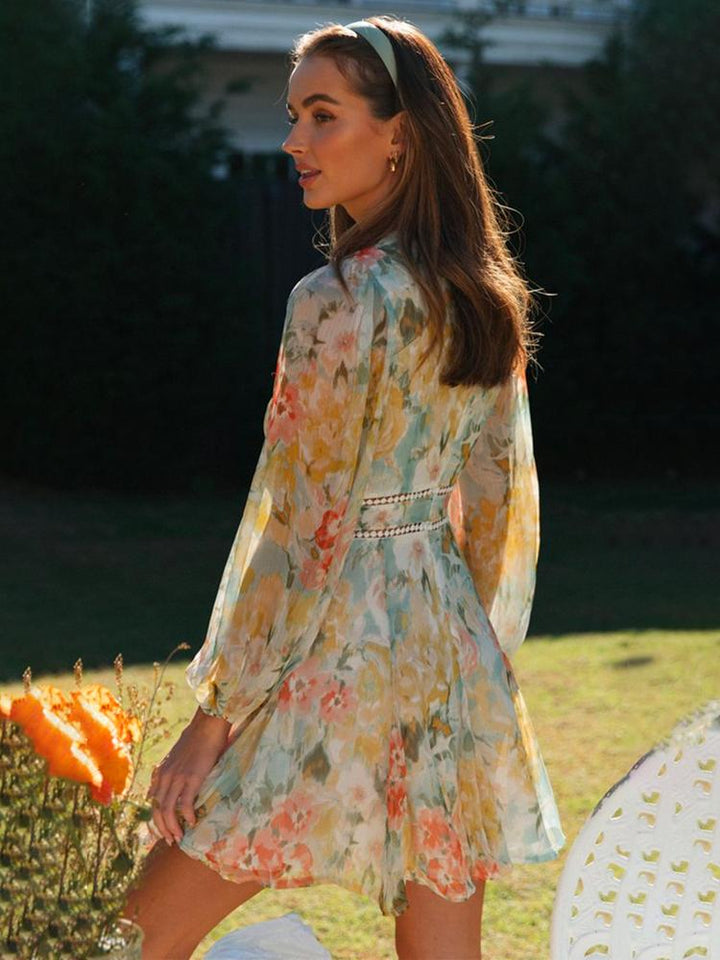 Echoarchiv | Bedrucktes Minikleid mit V-Ausschnitt und Spitze