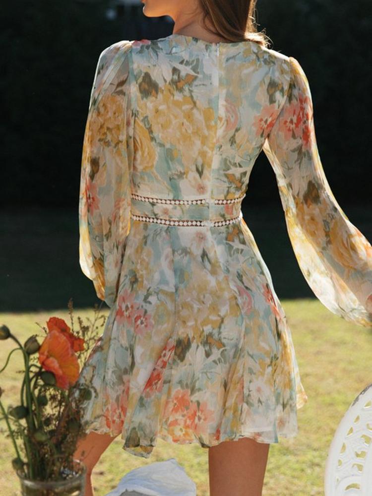 Echoarchiv | Bedrucktes Minikleid mit V-Ausschnitt und Spitze