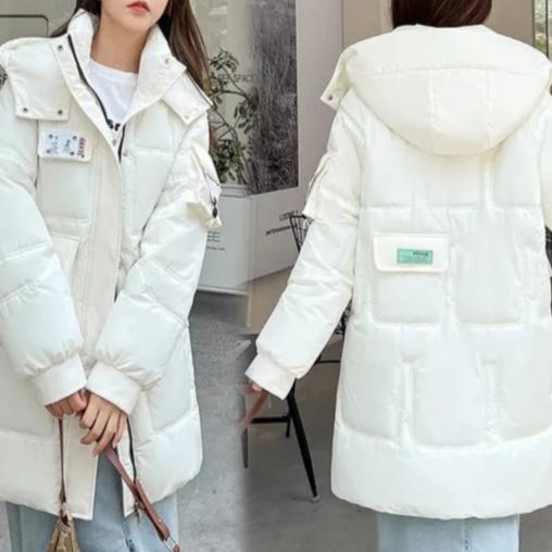 Winterparka - isolierte lange blaue Jacke mit praktischen Taschen – Avérine