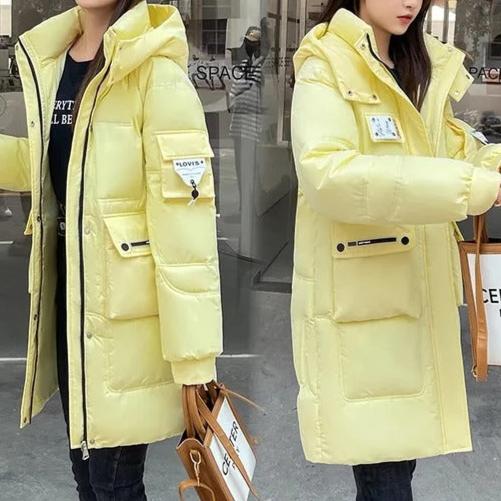 Winterparka - isolierte lange blaue Jacke mit praktischen Taschen – Avérine