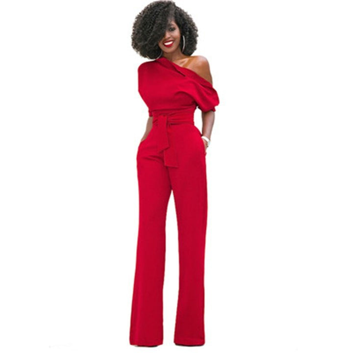 Echoarchiv | Schulterloser, Eleganter Jumpsuit mit Gürtel für Damen