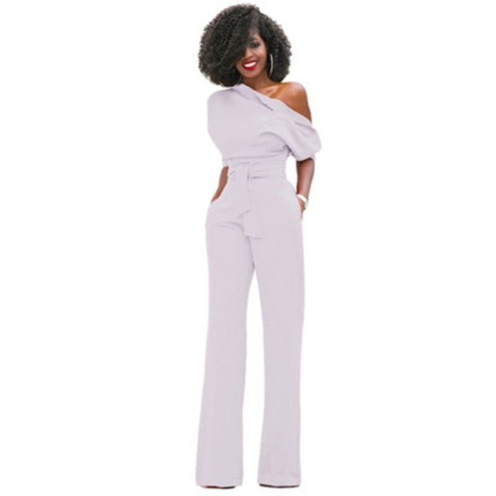 Echoarchiv | Schulterloser, Eleganter Jumpsuit mit Gürtel für Damen